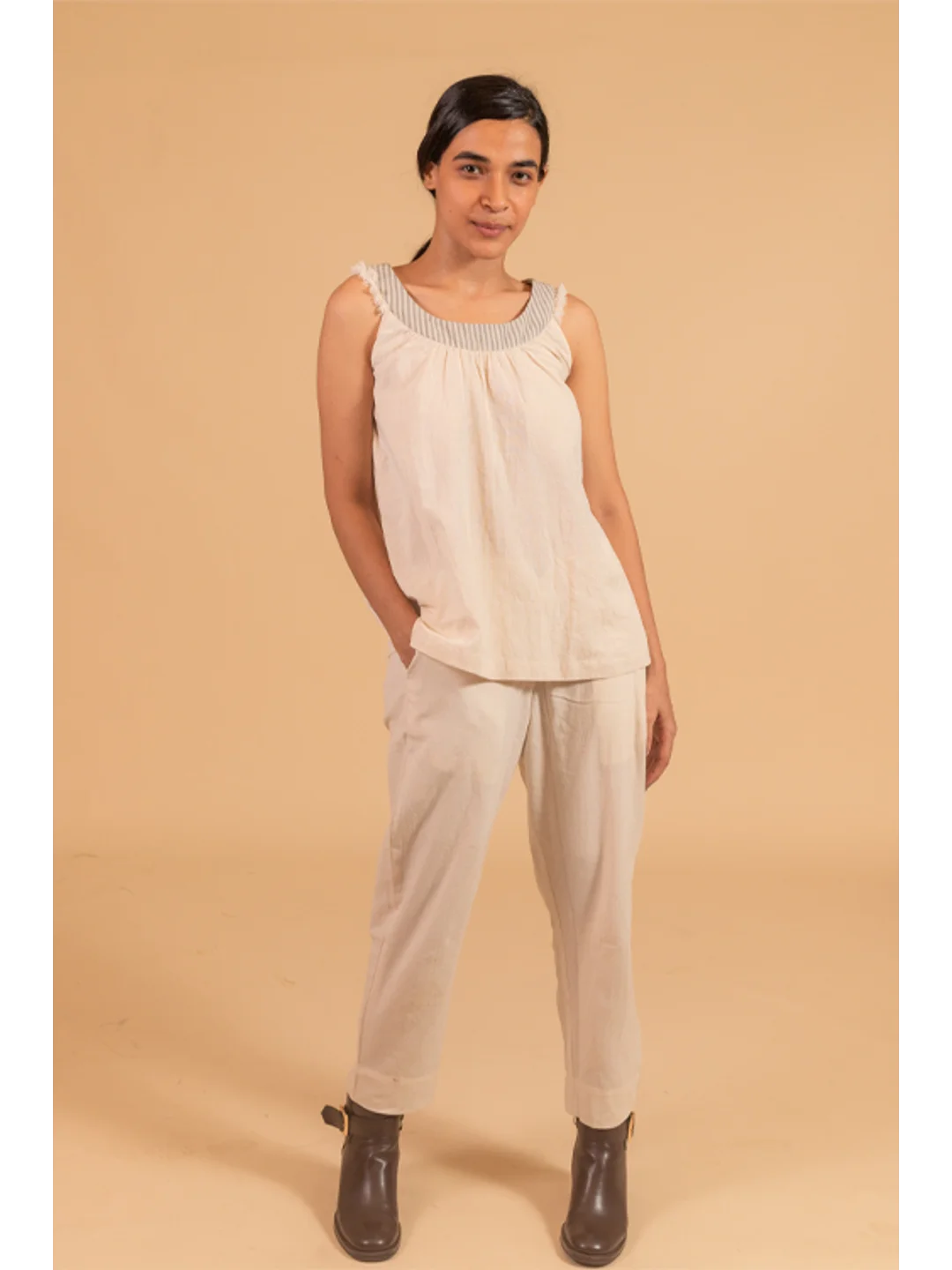 Sleevless Circurlar Top incut sleeves