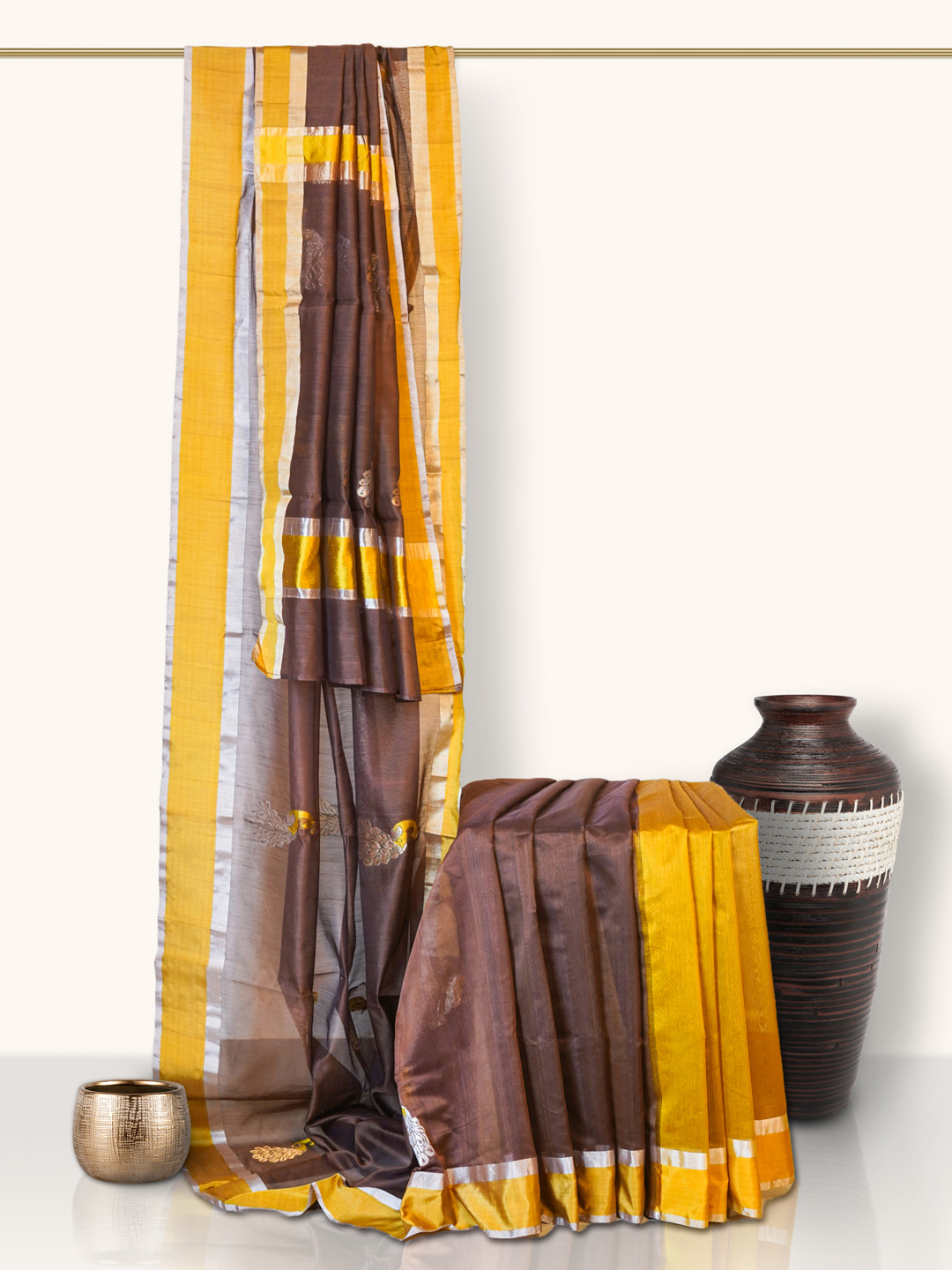 The Gold Weave Permium Chanderi Silk Saree - Brown Colour and Golden border with Peacock print.